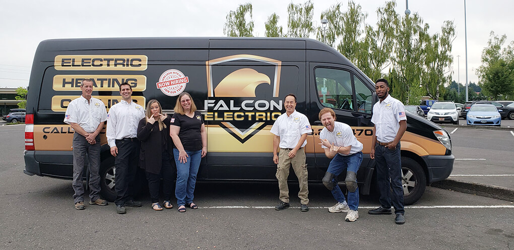 staff in front of van